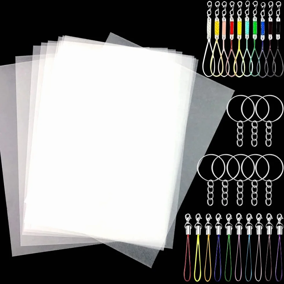 Kit de hojas de plástico retráctil NICAVKIT 70pcs 20x29cm Incluye 20 Película y 50 accesorios llaveros